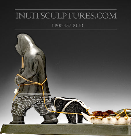 12" Hunter with Husky Dog by Famous Jimmy Iqaluq
